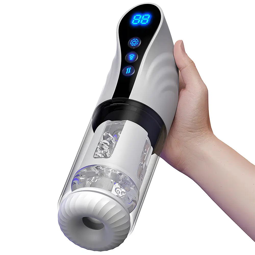 Handheld view of the auto rotating blowjob masturbator with digital display